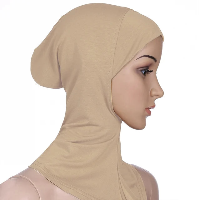 Breathable athletic underscarf hijab for women in a Creme by AmoorFemme. Made from sweat-wicking material for comfort during workouts.