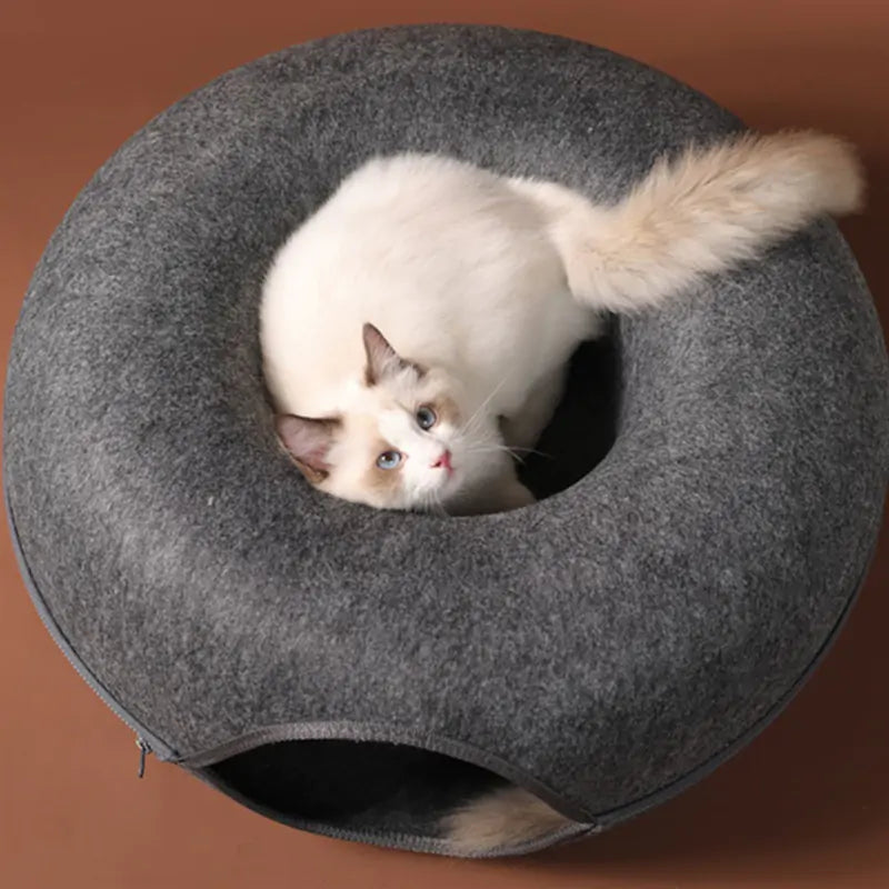 Large, cozy cat tunnel bed by AmoorPet. Features a spacious tunnel for playing and a soft, washable bed for relaxing. Sturdy zipper for easy access and cleaning.