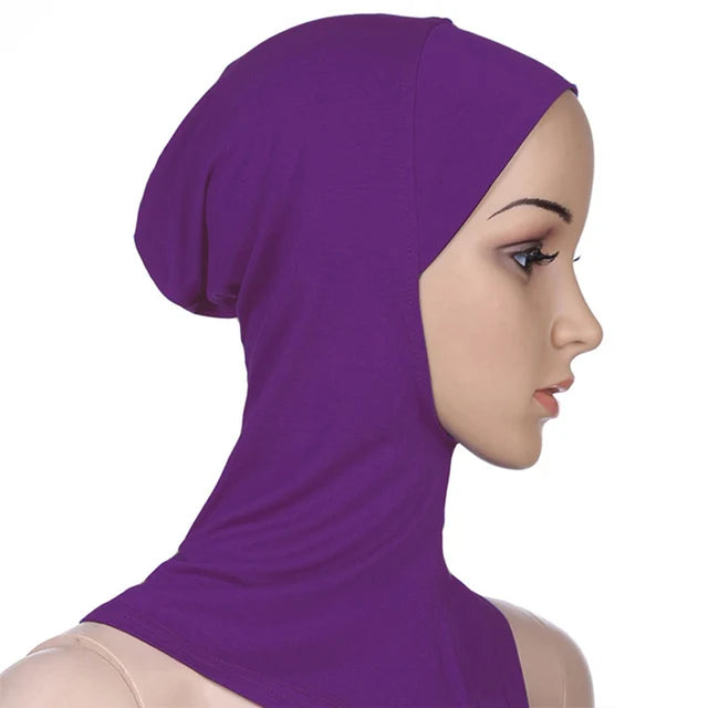 Breathable athletic underscarf hijab for women in a Purple by AmoorFemme. Made from sweat-wicking material for comfort during workouts.