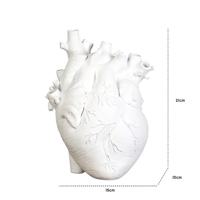 AmoorCity Heart-Shaped Table Vase. Ceramic vase in a heart shape. Perfect for adding a romantic touch to any tabletop arrangement.