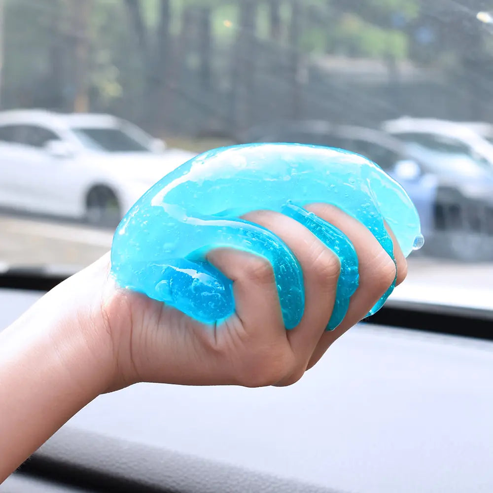 AmoorCity Car Wash Interior Car Cleaning Gel. Reusable car cleaning gel designed to remove dust, dirt, and crumbs from car interiors. Reaches into tight spaces and leaves surfaces clean.
