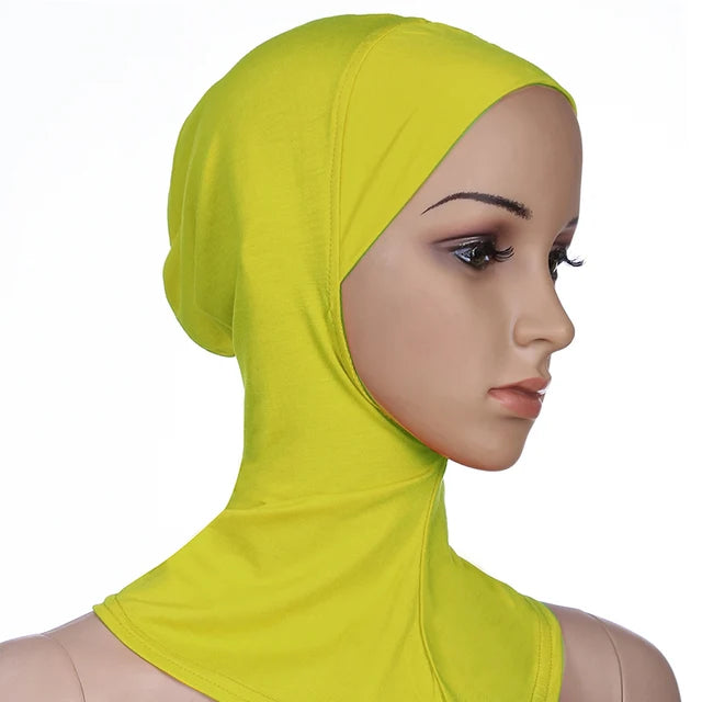 Breathable athletic underscarf hijab for women in a Yellow by AmoorFemme. Made from sweat-wicking material for comfort during workouts.