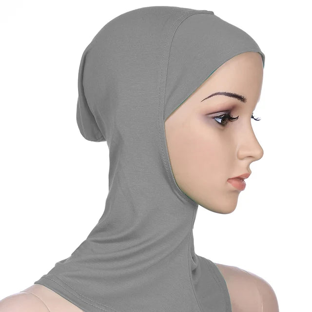 Breathable athletic underscarf hijab for women in a Silver by AmoorFemme. Made from sweat-wicking material for comfort during workouts.
